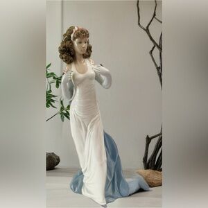 Elegant Lladro Porcelain Figurine with Blue and White Dress